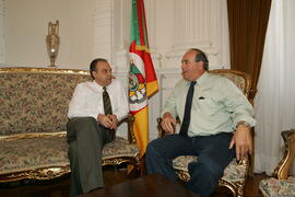 Chefe da Casa Civil, Alberto Oliveira, recebe visita do vereador de Ibiruba, Tuta Rebelato. Autor: Ivan de Andrade