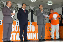 Chefe da Casa Civil, Alberto Oliveira, durante cerimônia do 8º sorteio do programa A Nota é Minha, em Caxia do Sul. Autor: Siliane Vieira